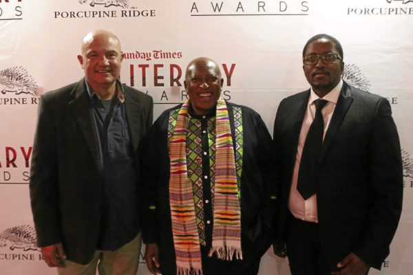 24/05/2016. Greg Marinovich winner of the Alan Paton Award for non-fiction, Zakes Mda winner of the Barry Ronge Fiction Prize with the Editor of the Sunday Times Bongani Siqoko.
Picture: Masi Losi